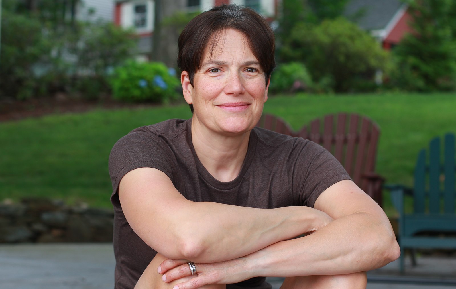 Lynne Tapper seated outdoors